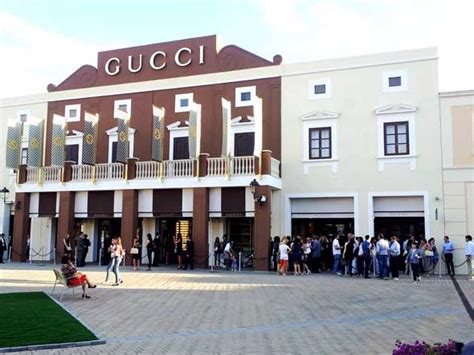 sicilia outlet village gucci|gucci sito ufficiale.